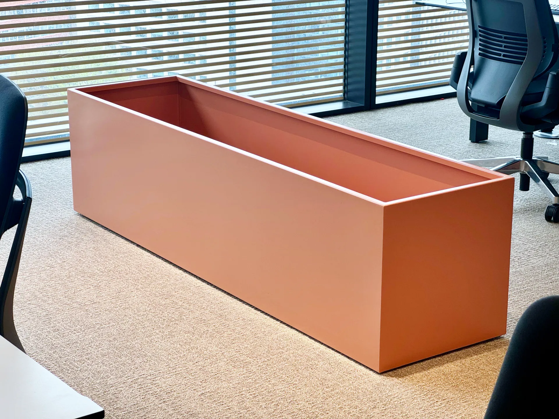 Large custom made interior planter in bespoke colour for commercial space